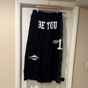 Dressed in LALA Black and Teal Flare Pants